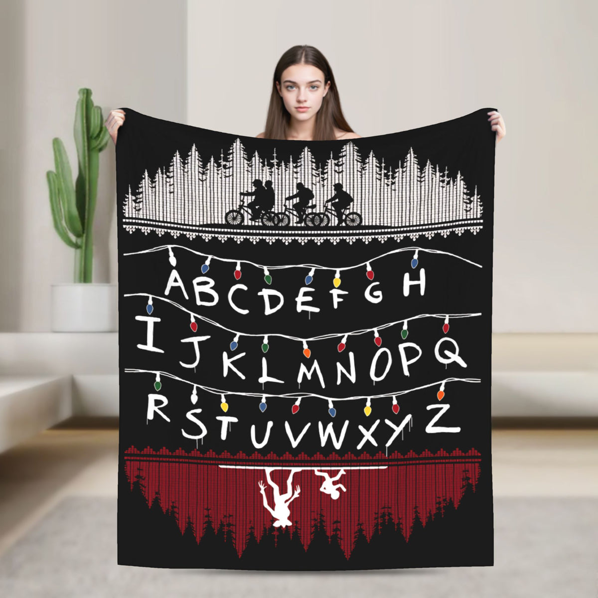 Plaid Stranger Things alphabet sur fond de forêt vu de face