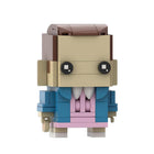 Statuina testa grande da costruire Stranger Things Undici in vestito rosa