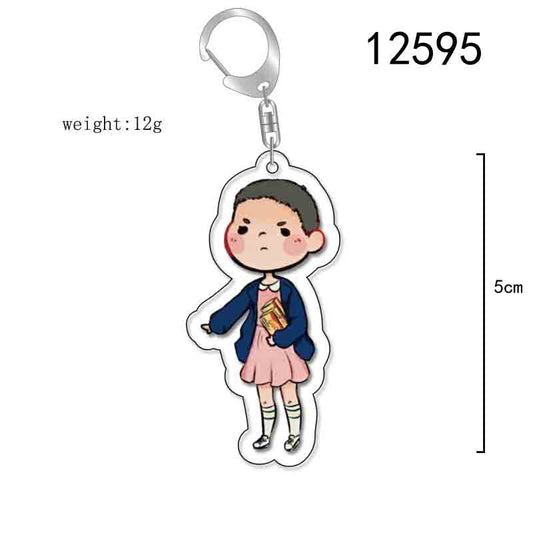 Porte-clés chibi Stranger Things Onze perruque blonde et gaufre vu de face