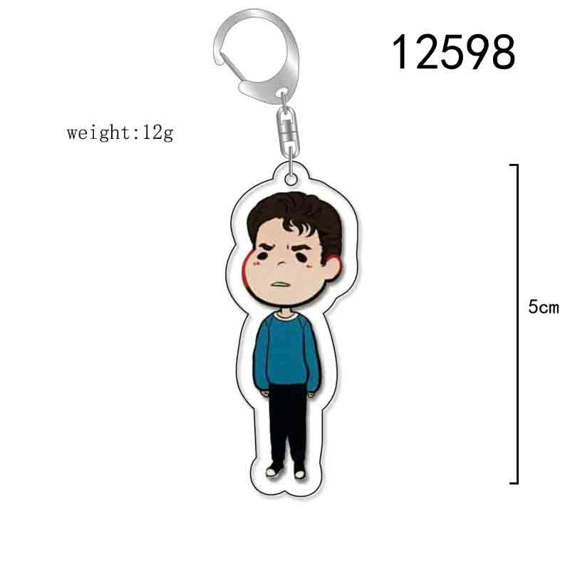 Porte-clés chibi Stranger Things garçon brun pull bleu vu de face