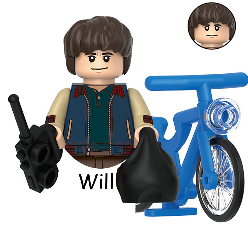 Mini figurine à construire Stranger Things Will Byers et son vélo bleu vu de face