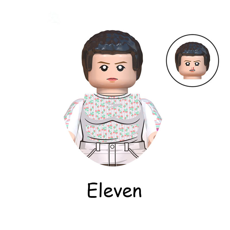 Mini figurine à construire Stranger Things Onze en blouse d'hôpital vu de face
