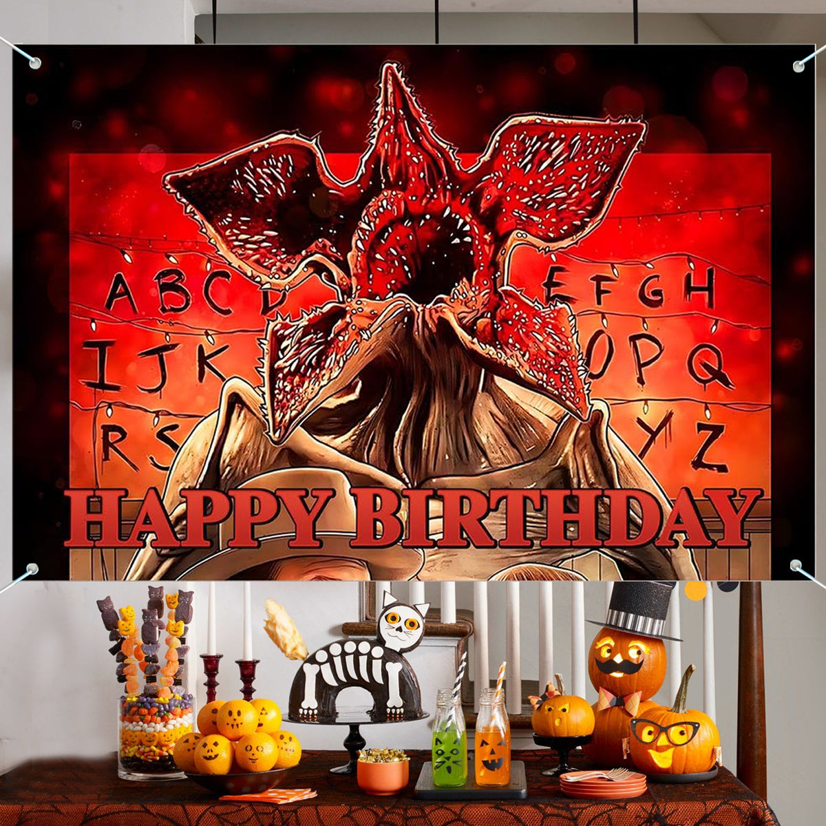 Toile de fond anniversaire Stranger Things Demogorgon guirlande vu de face