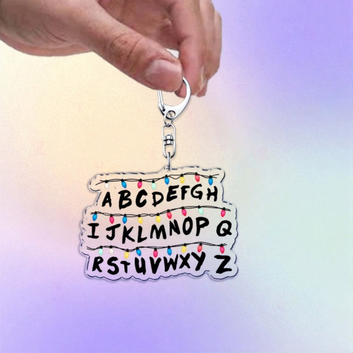 Porte-clés Stranger Things mur alphabet vu de face